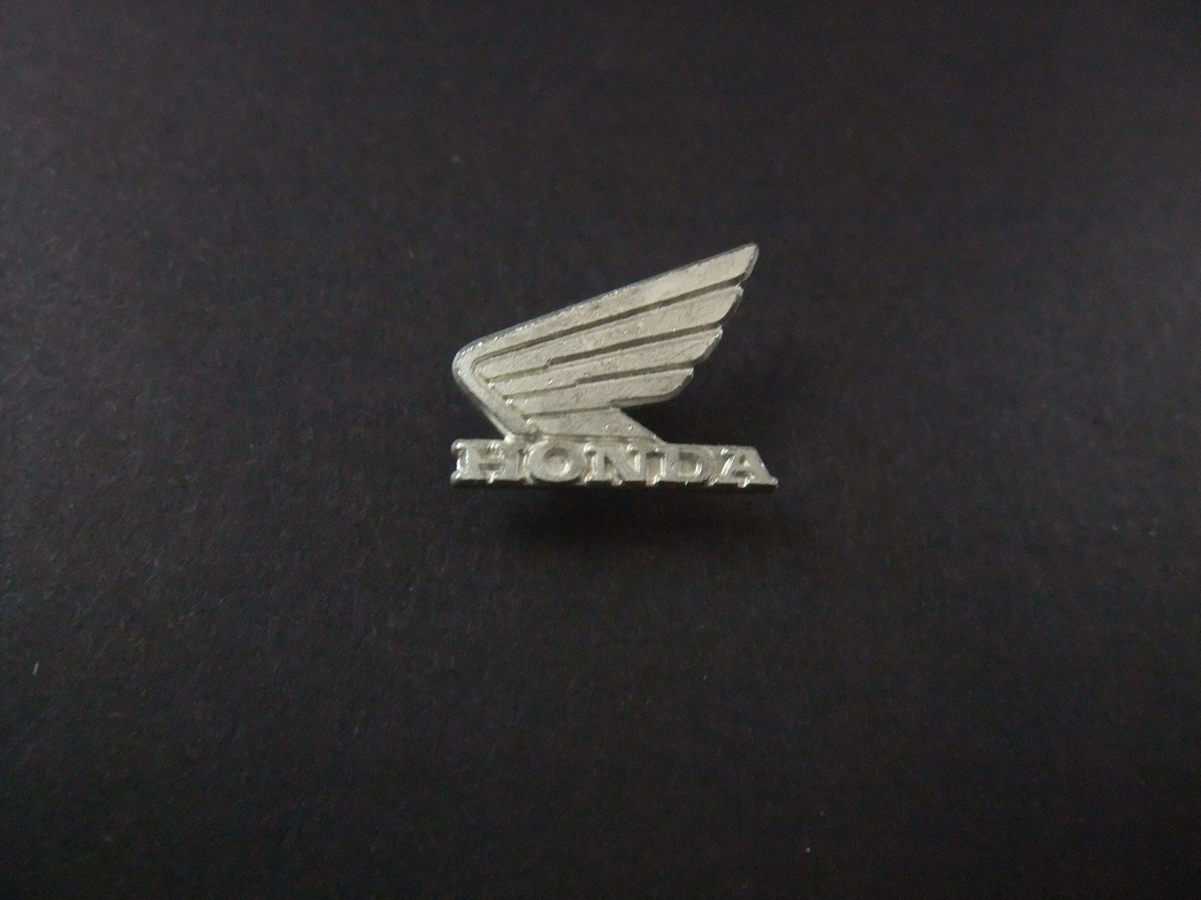 Honda motor zilverkleurig logo